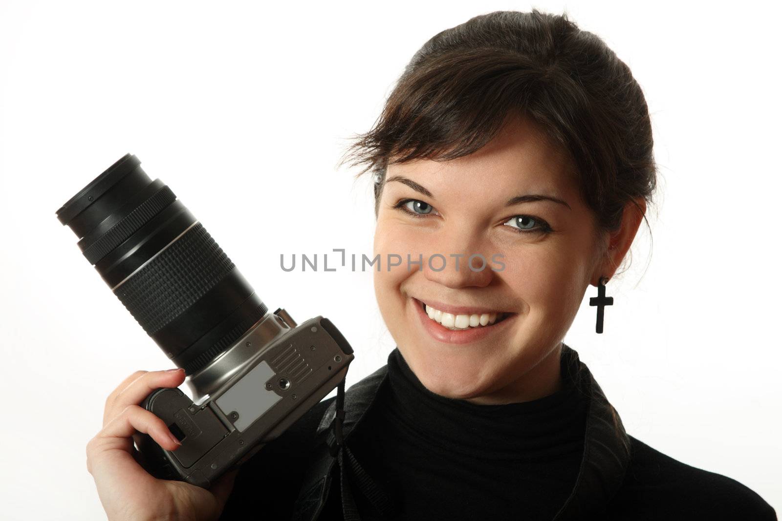 The beautiful girl with a camera on a white background