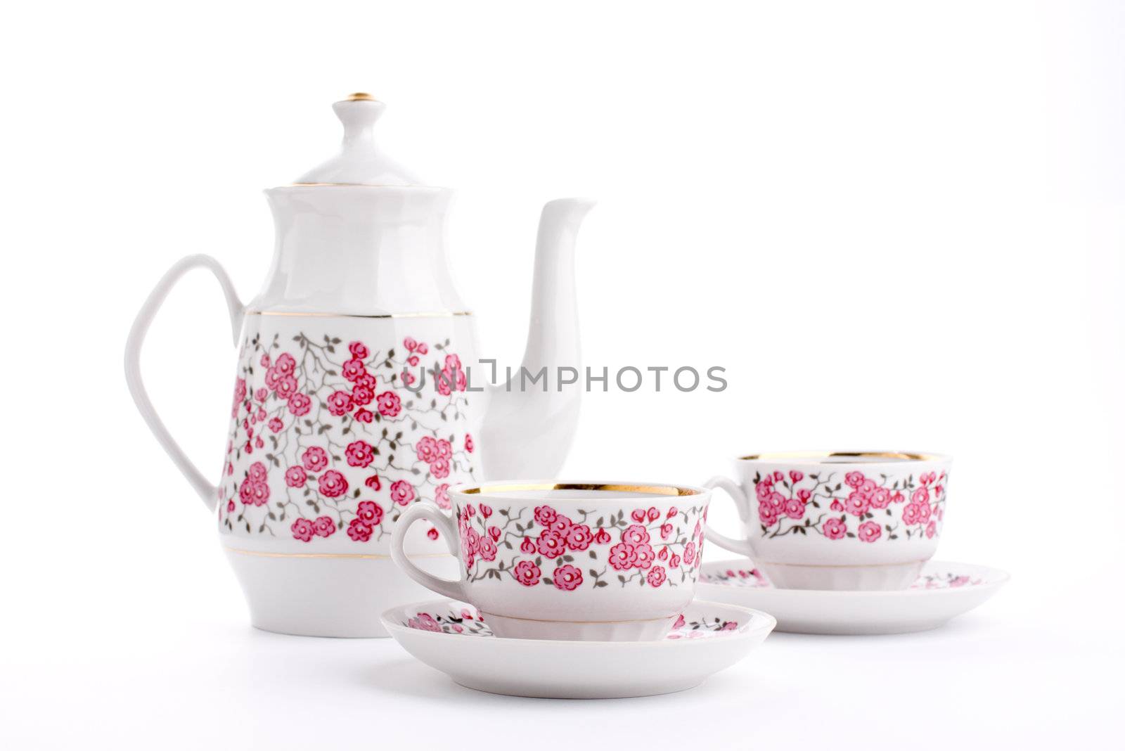 Elegant porcelain tea set isolated over white