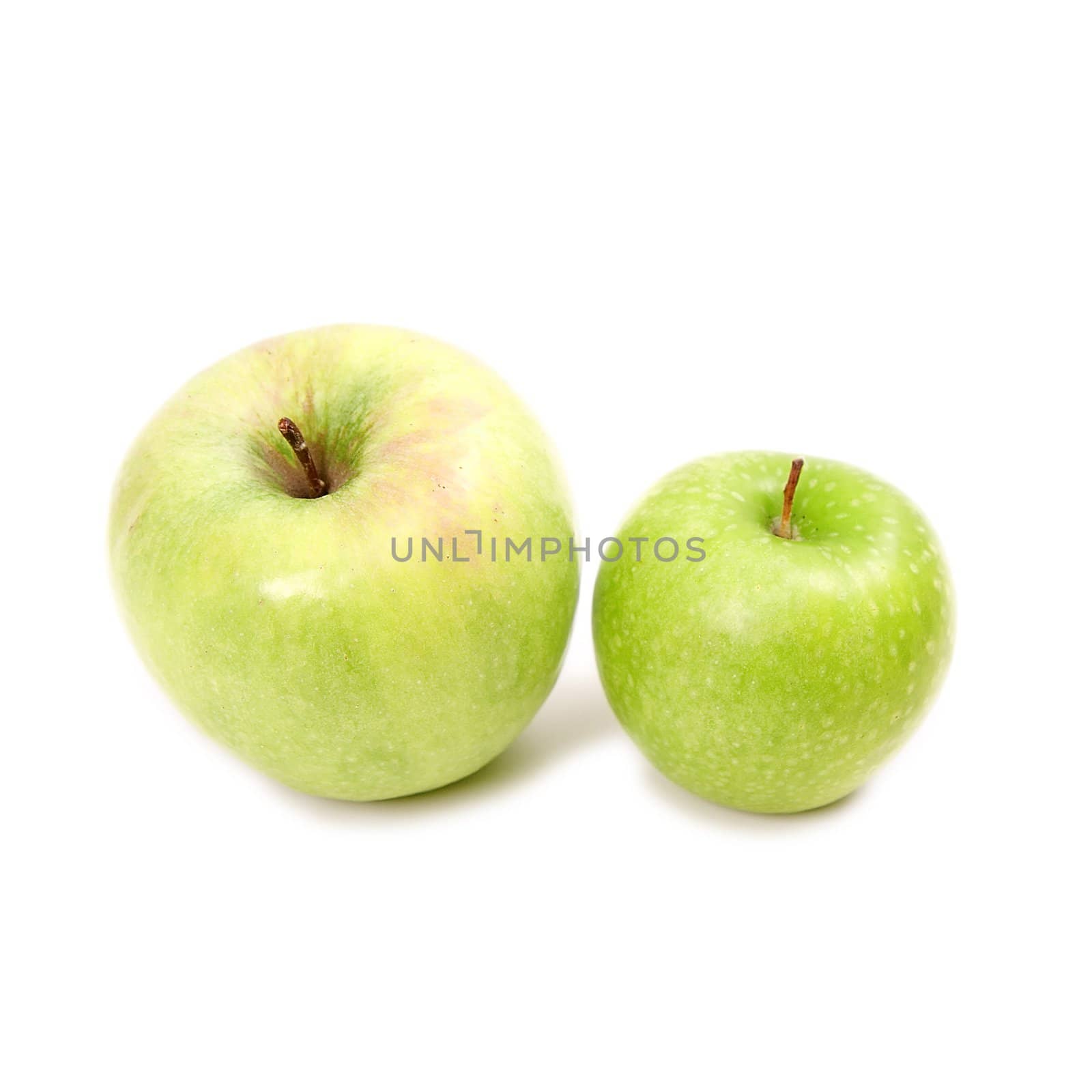 Two green apples on white background close-up
