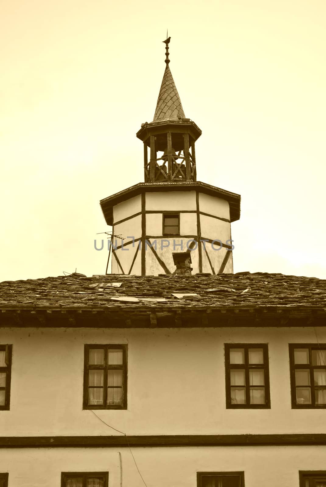 Tryavna and clock tower in sepia � old style historical city in North Bulgaria