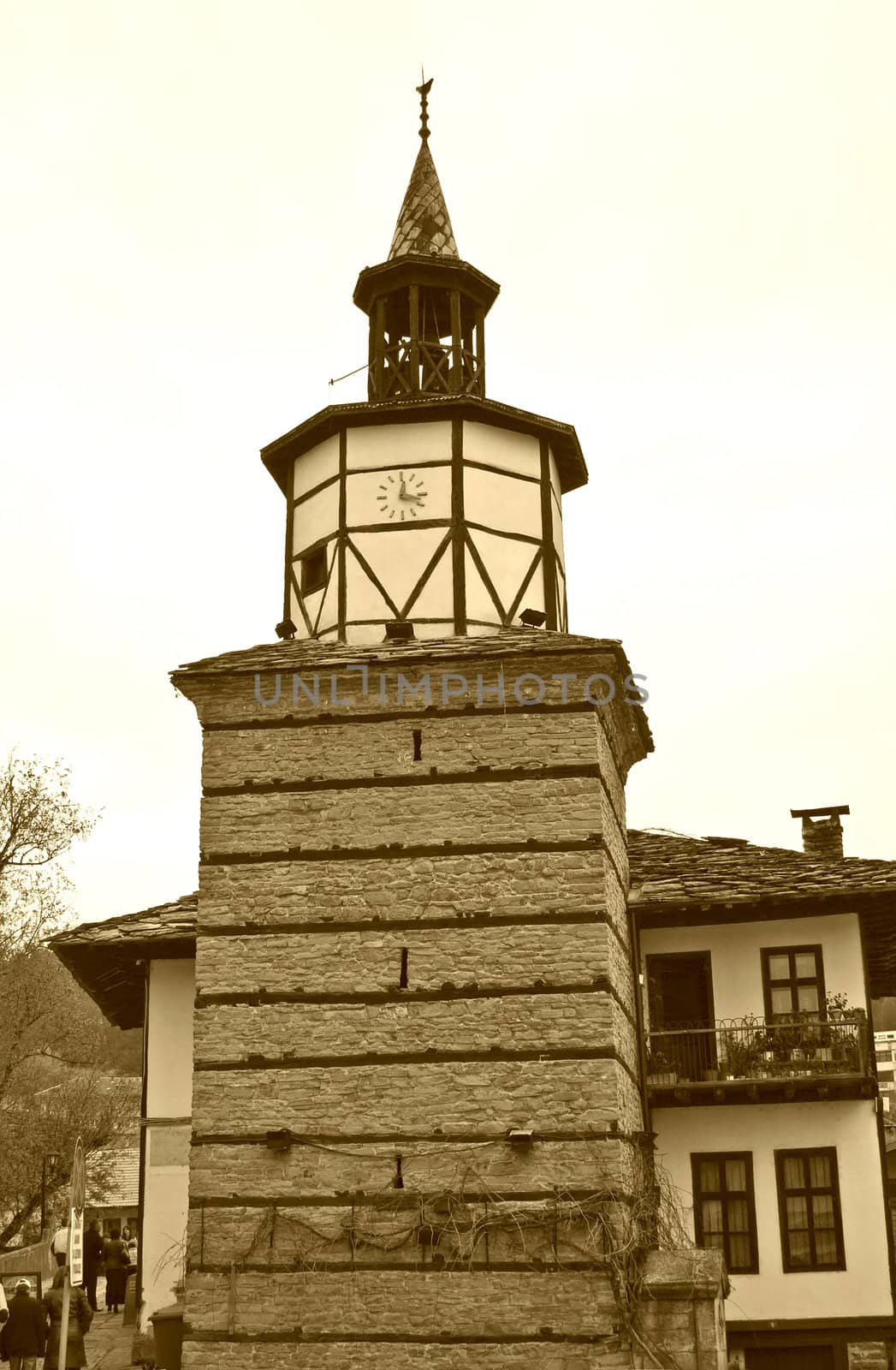 Tryavna and clock tower in sepia � old style historical city in North Bulgaria