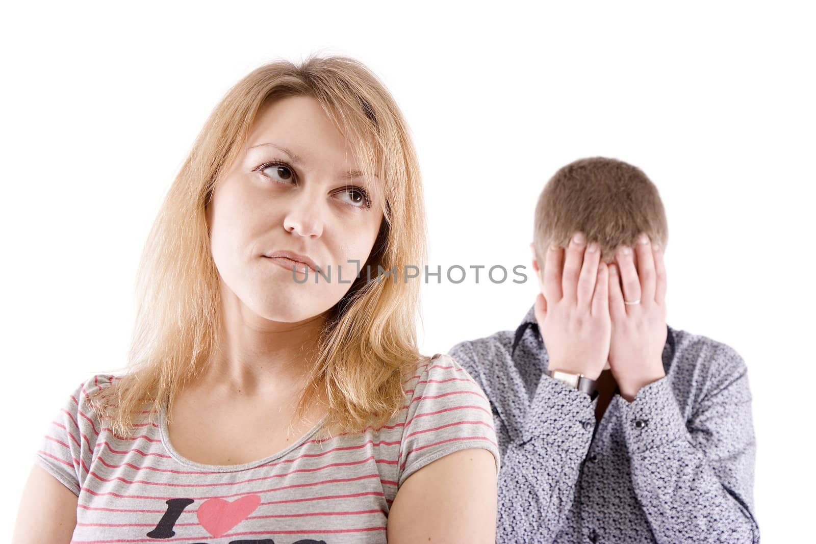 The young woman in the foreground and the upset man for background