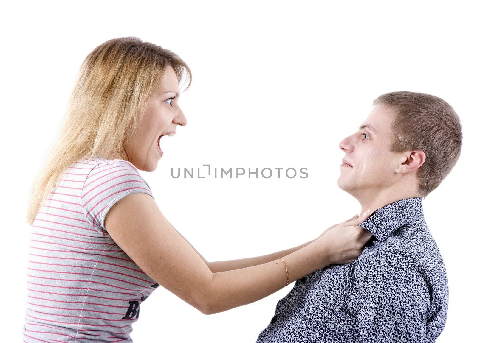 young woman abusing a man holding him by the shirt