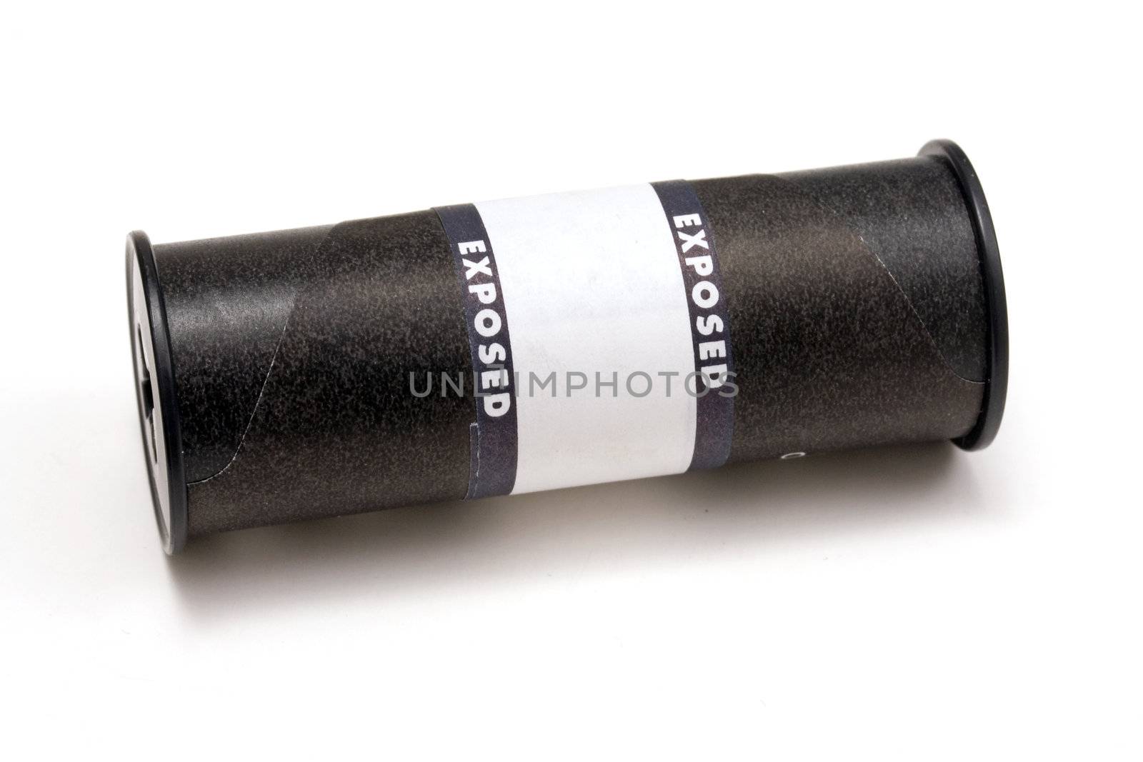 A roll of exposed film isolated on white