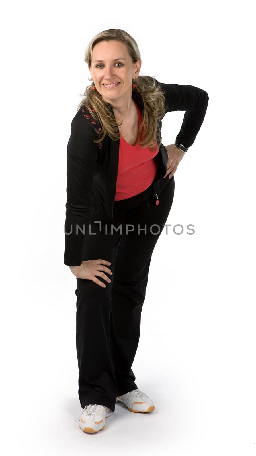 Young women with sportswear on white background