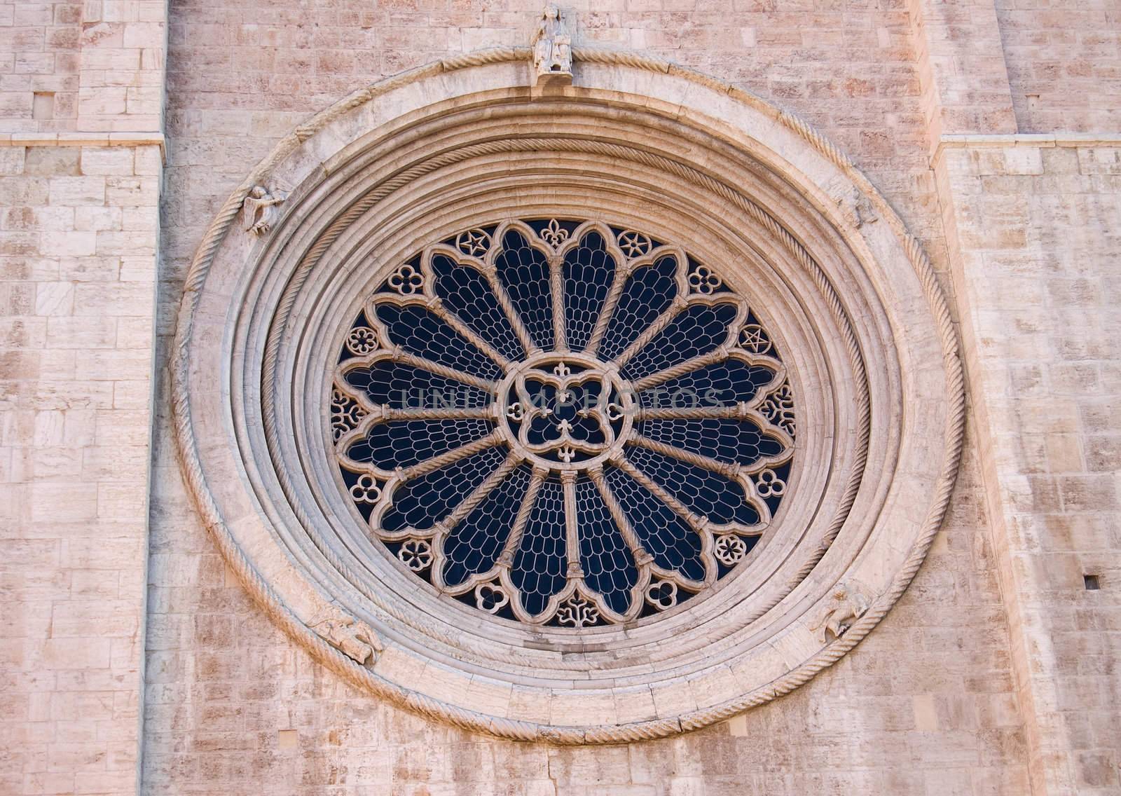 Rose window detail of the twelfth-thirteenth century Cathedral of San Vigilio, Duomo of Trento, Italy