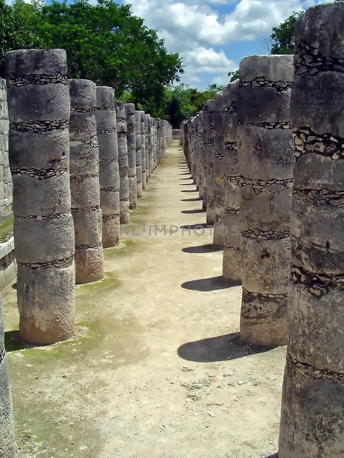 Ruins of a colonnade in maya city chichen itza                           