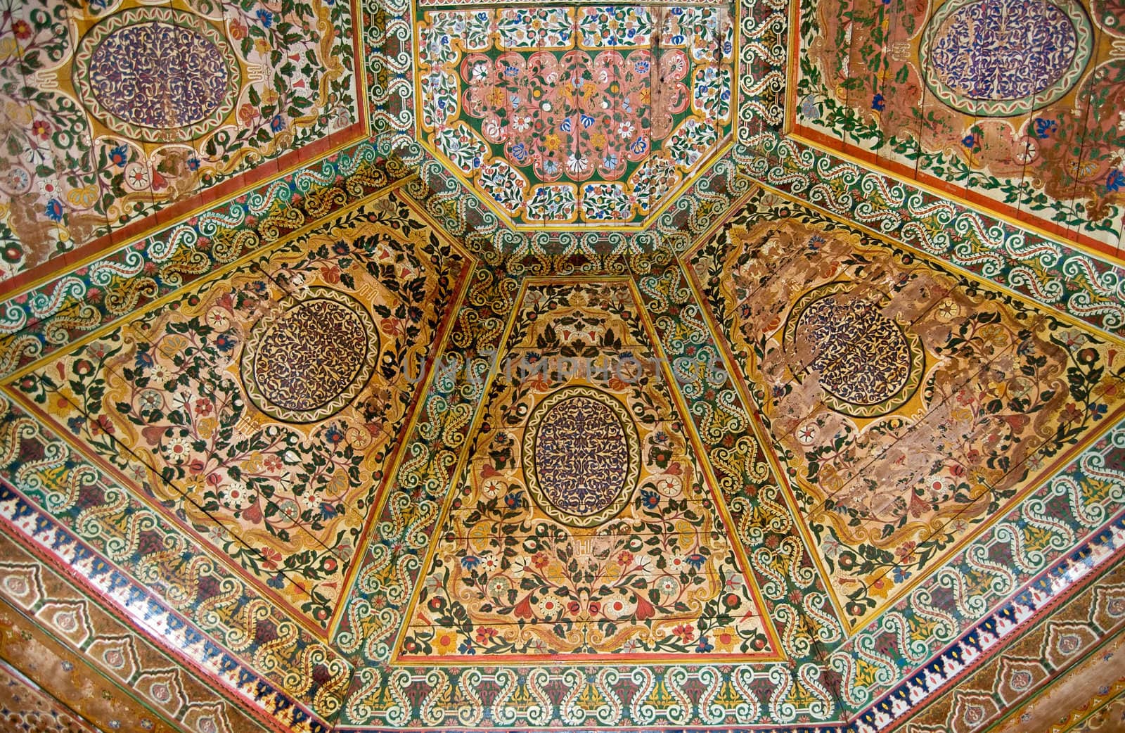 A painted wooden ceiling of the Bahia Palace in Marrakesh, Moroc