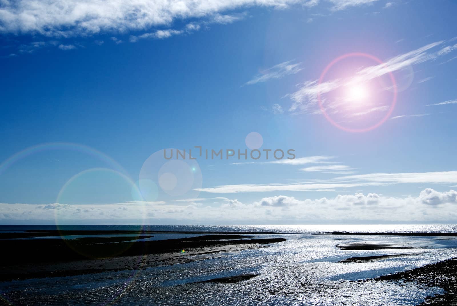 It is so beautiful sea with clouds and rock.