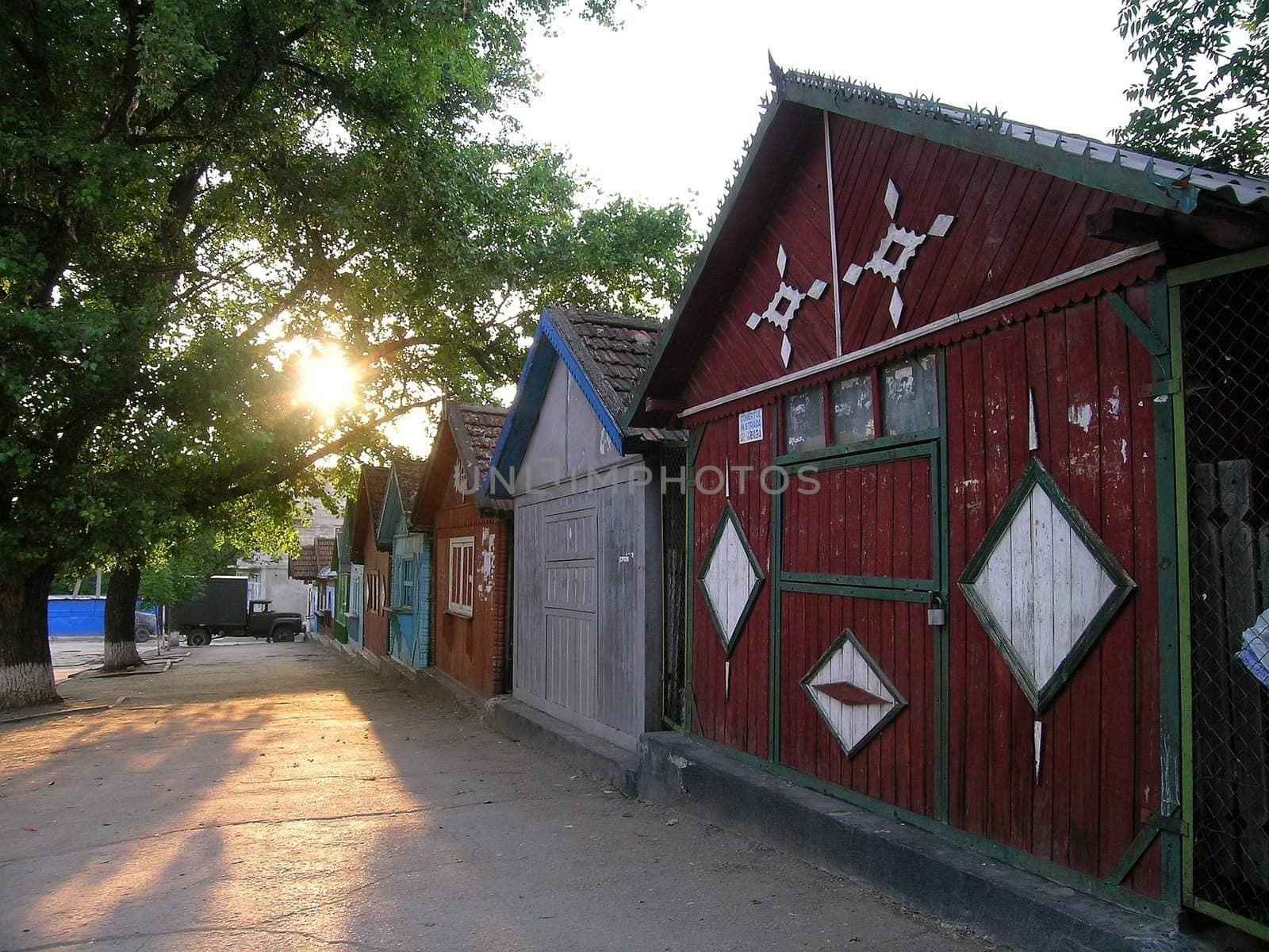 old wooden huts and empty street