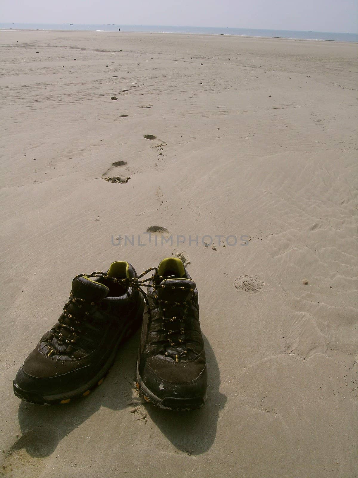 old shoes on the beach