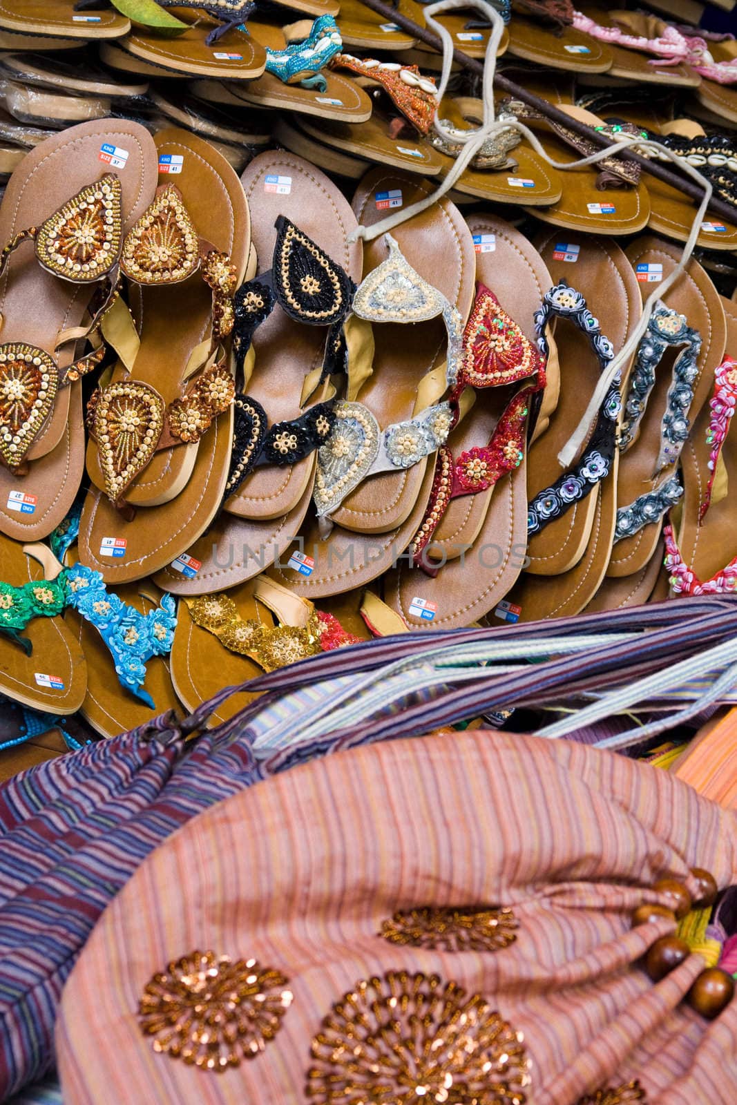 Detail of market stand with handmade sandals and purses, Bali, Indonesia.