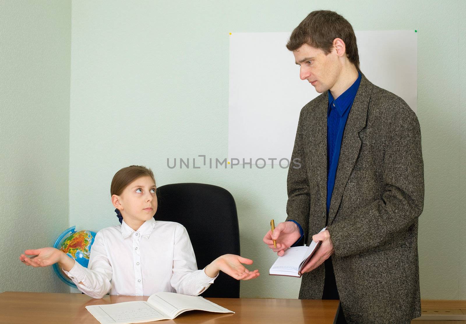Tutor in a suit and its small schoolgirl