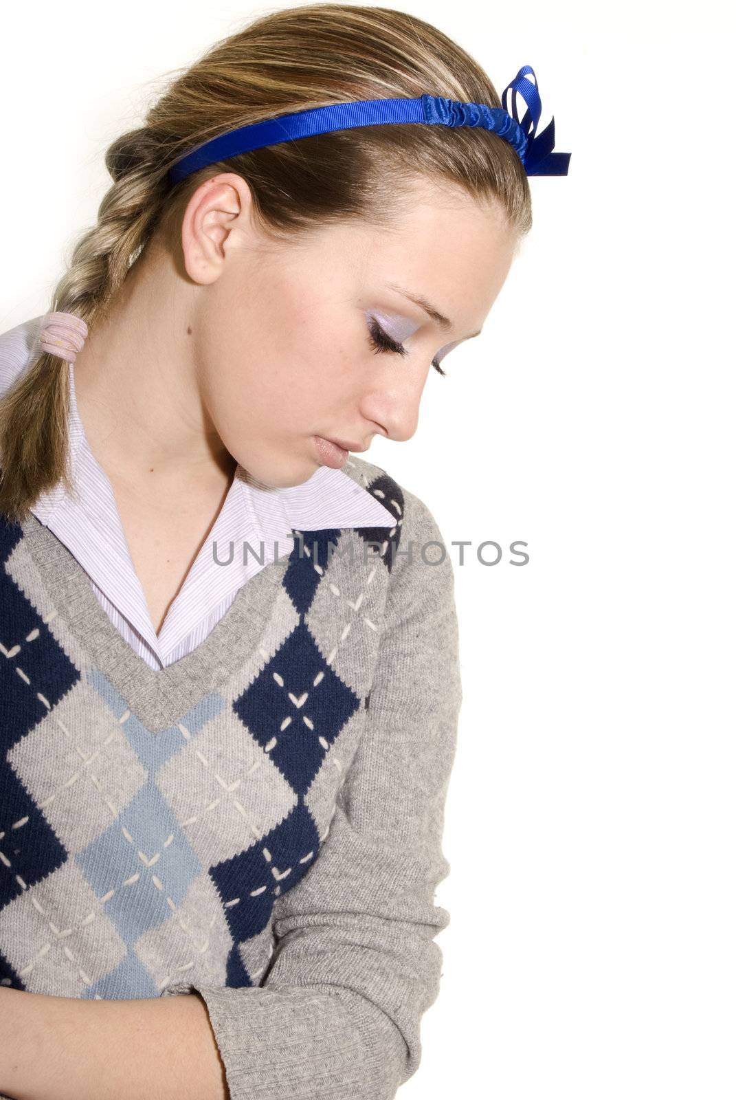 Portrait of a young  beautiful  fashionable girl with closed eyes over white