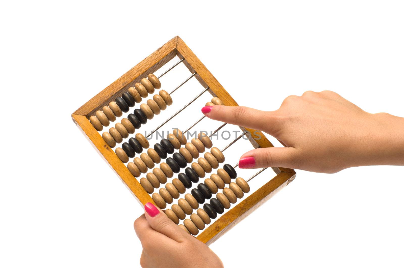 Female hands hold a wooden abacus is isolated on a white background.