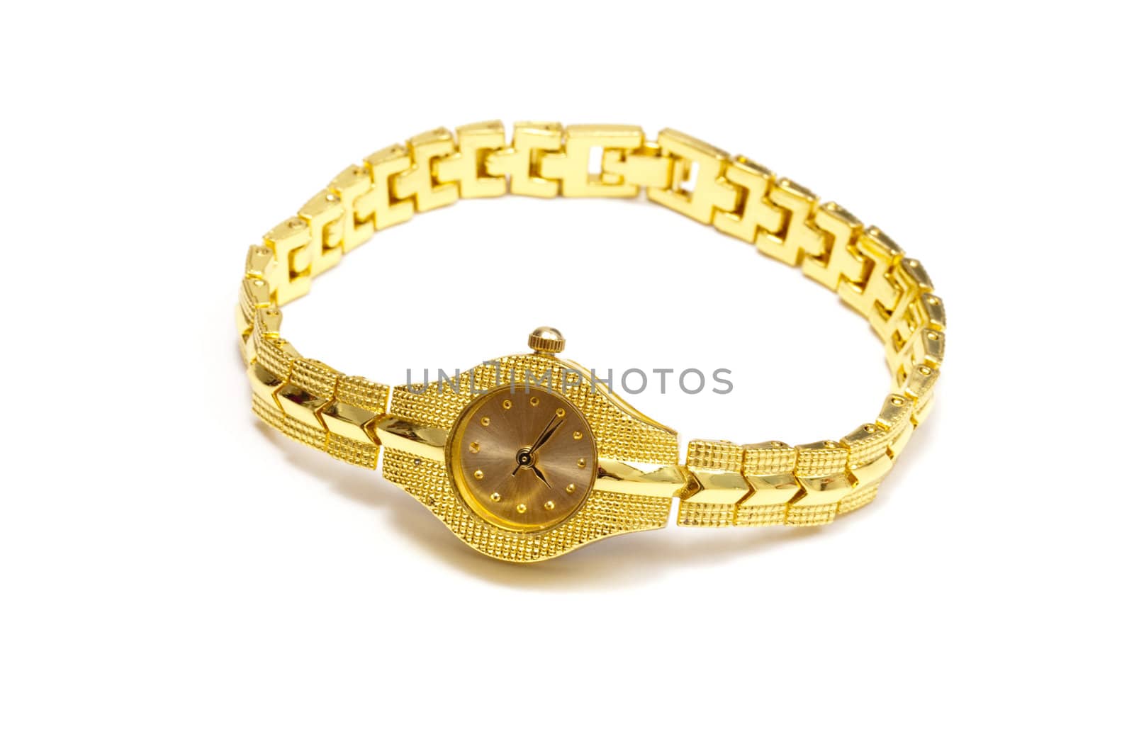 Woman gold wrist watch by ibphoto