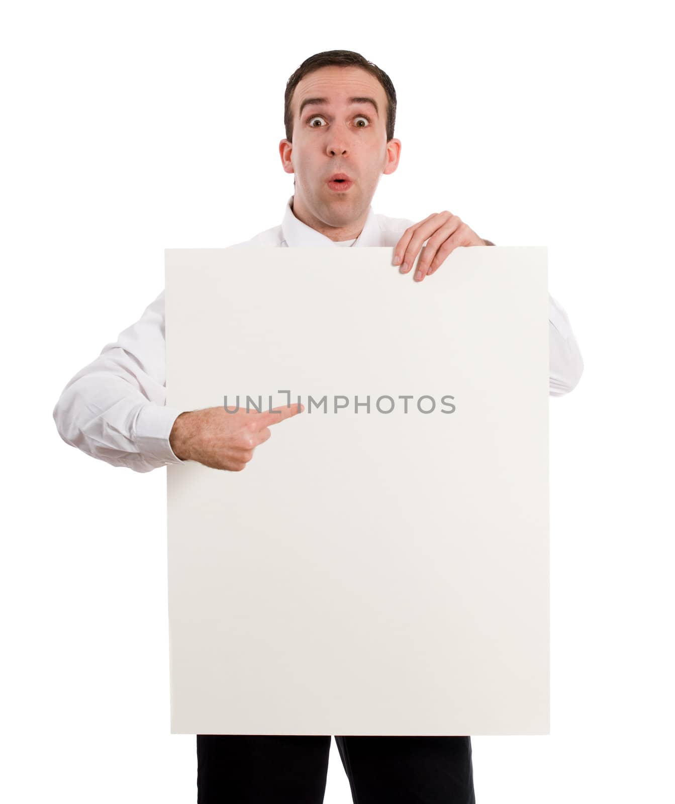 A young man holding up a paper sign, which you can use for your text, isolated against a white background