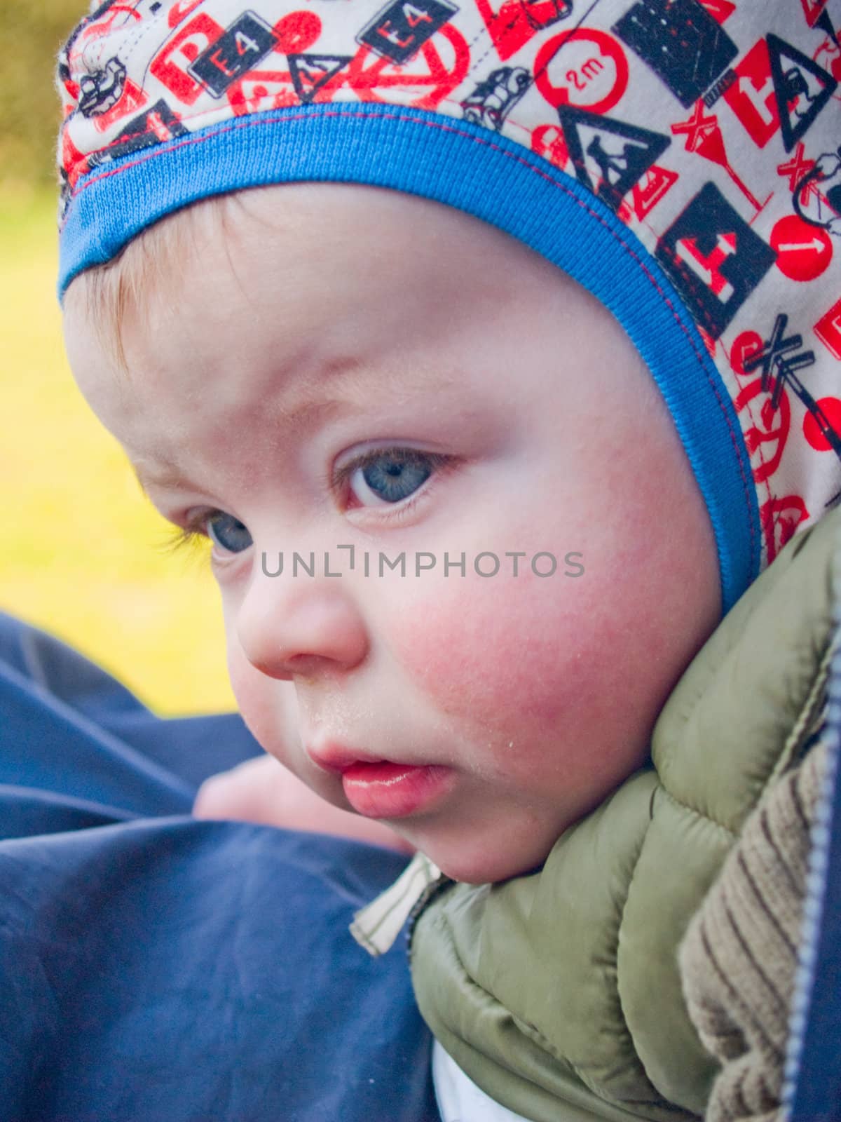 Blue eyed baby boy showing expressions
