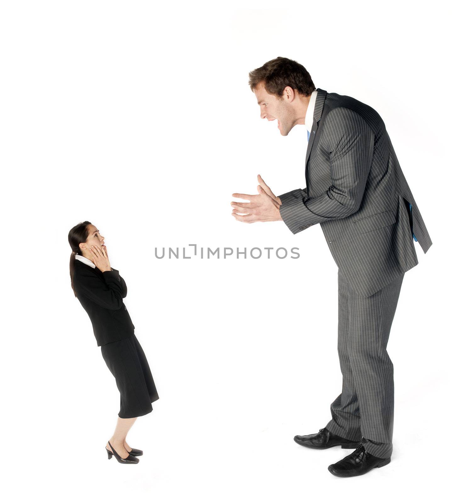 A business man making a colleague feel small