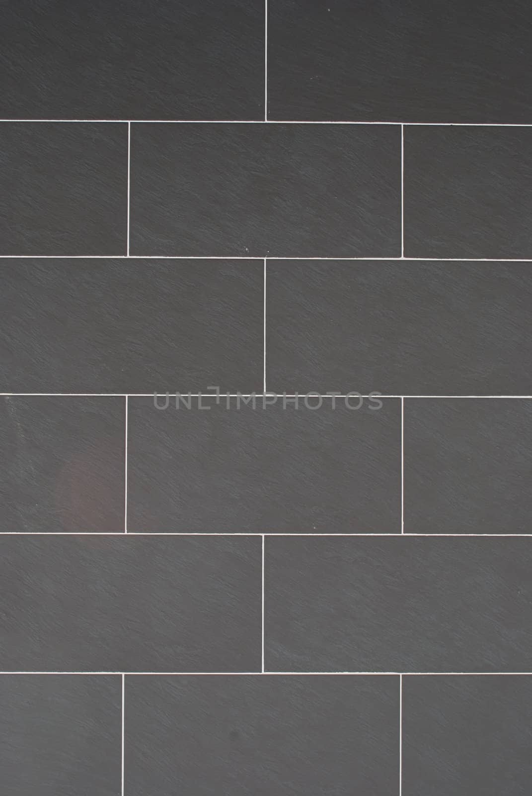wall made of rectangular grey shale stones
