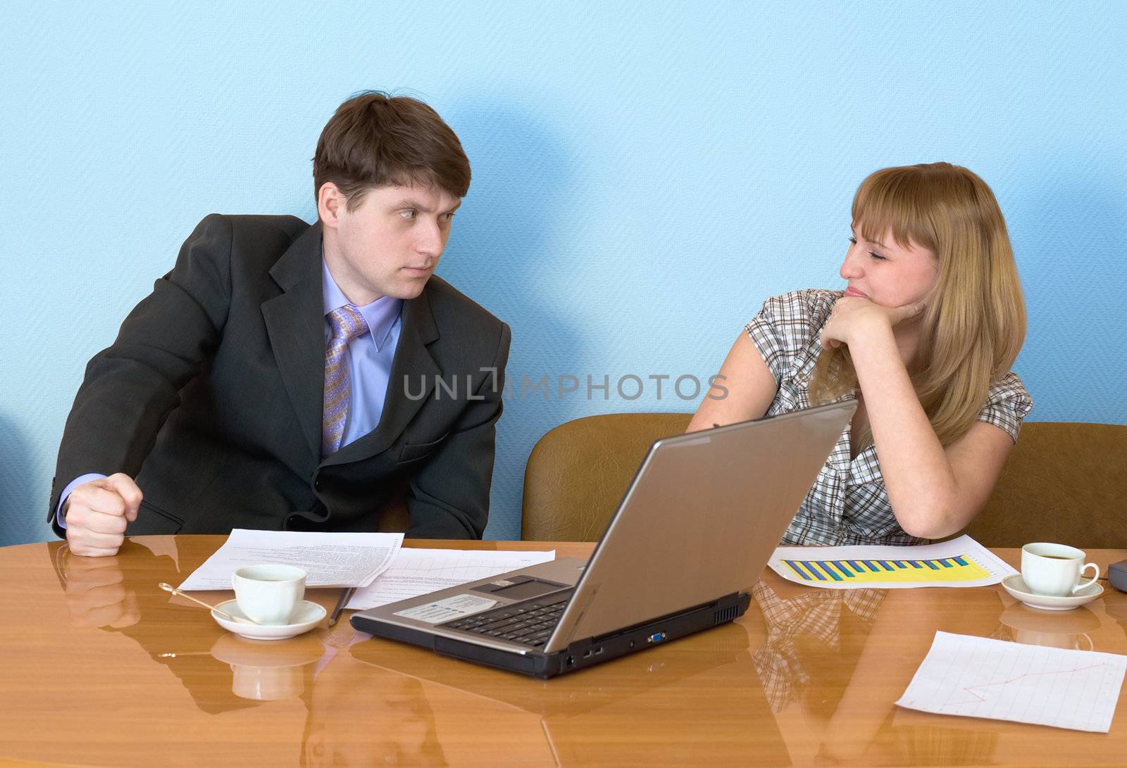 Girl sitting at a desktop and their chief