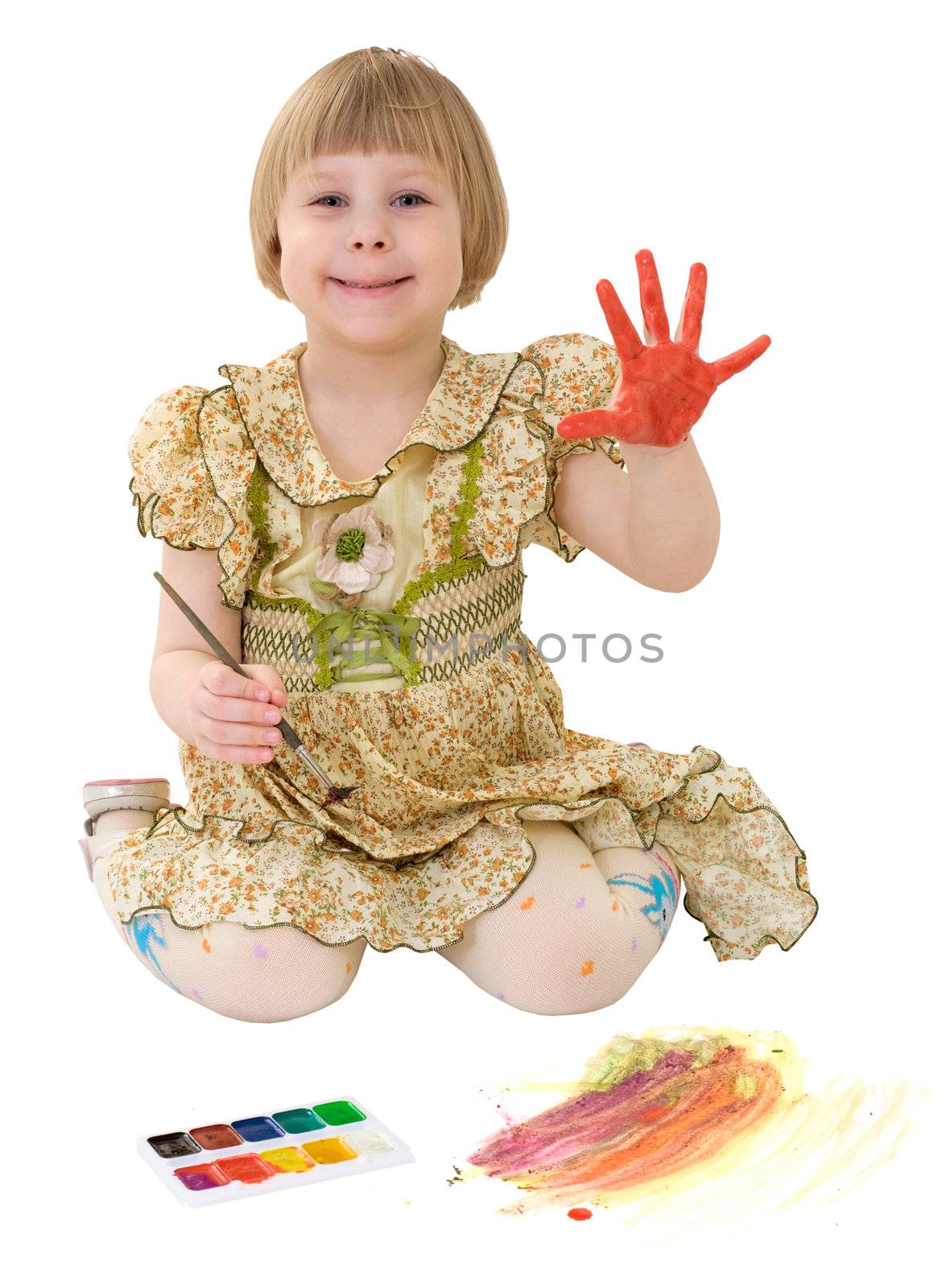 Little girl drawing of water-colore on the white