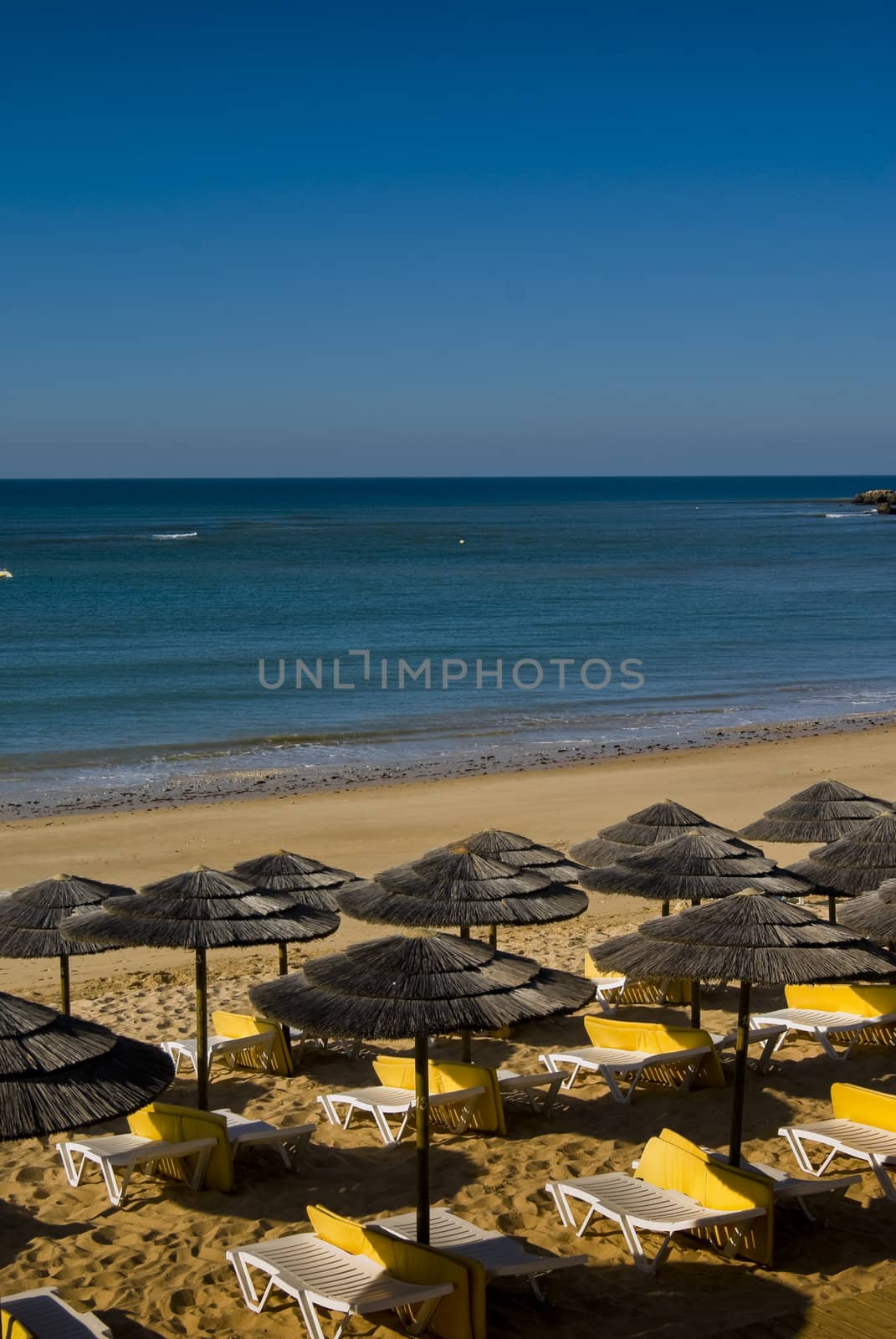 Sunbeds on Oura beach in Albufeira Portugal