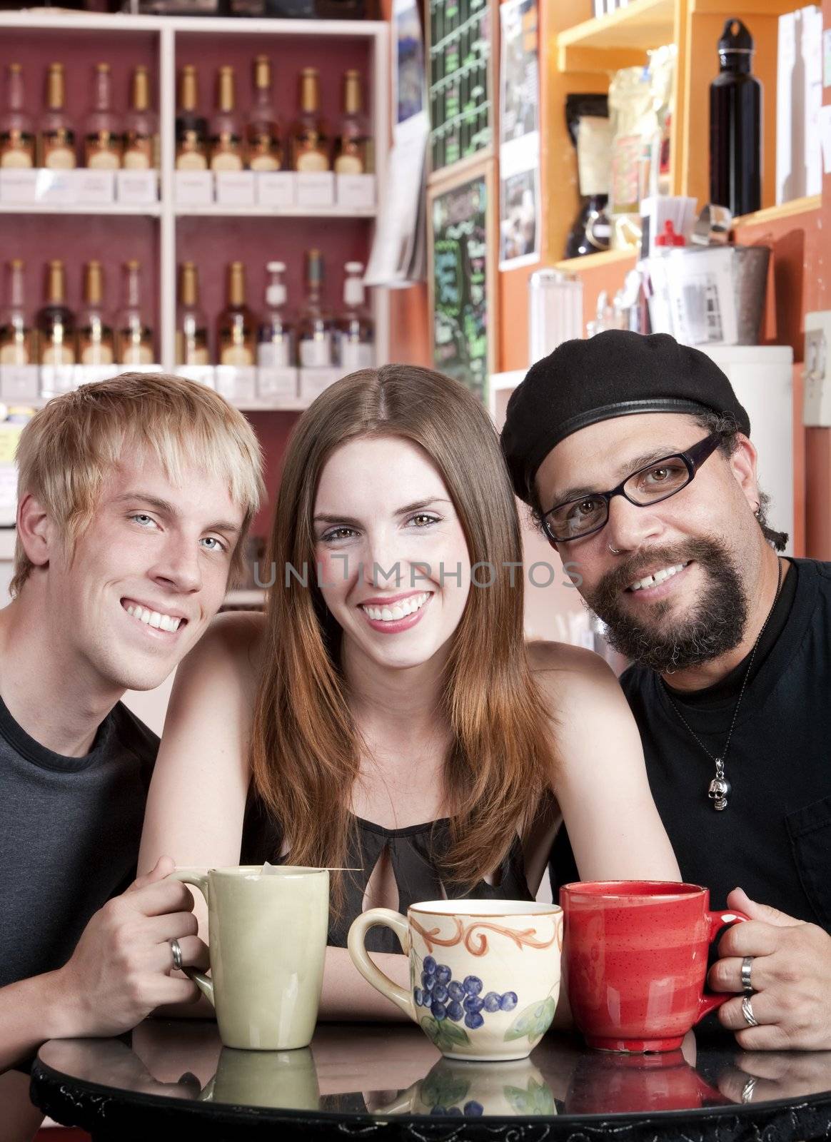 Woman with two male friends in a coffee house by Creatista