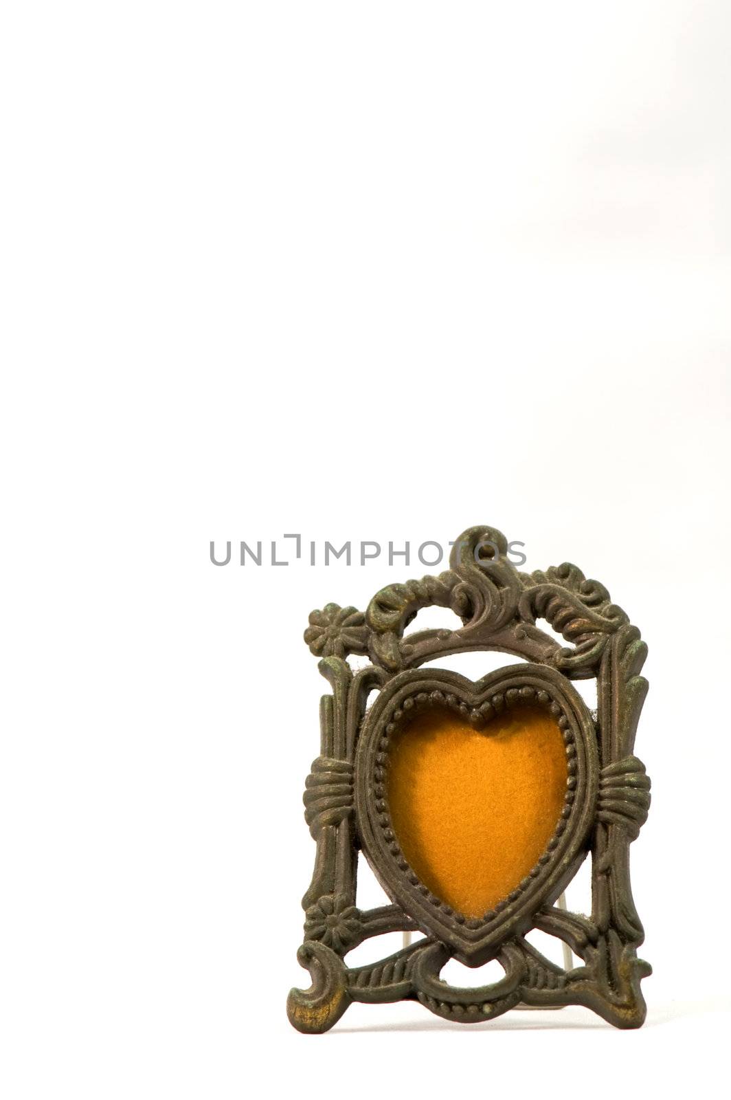 The antique photo frame isolated over white