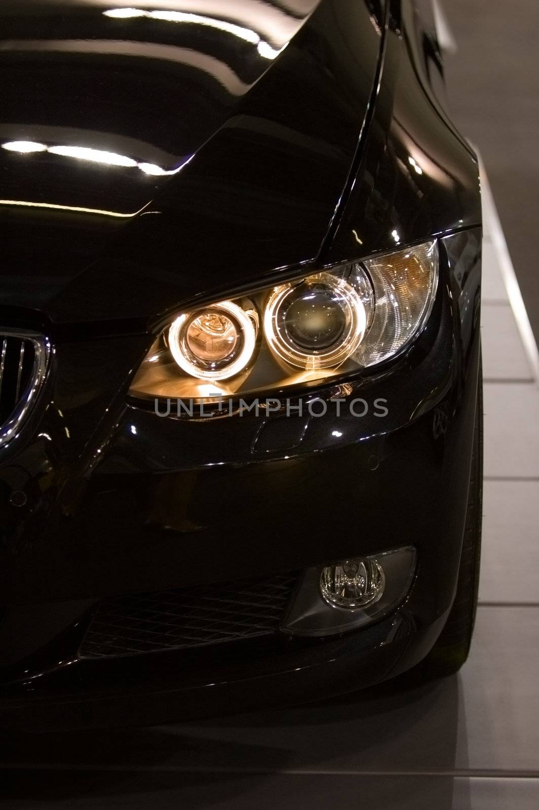 A close up shot (front view) of sportive car