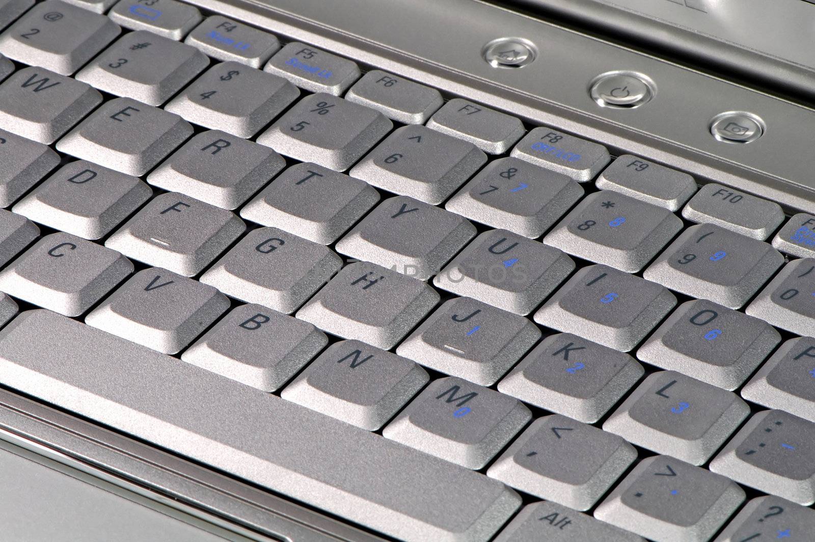 The close up of modern laptop computer's keyboard