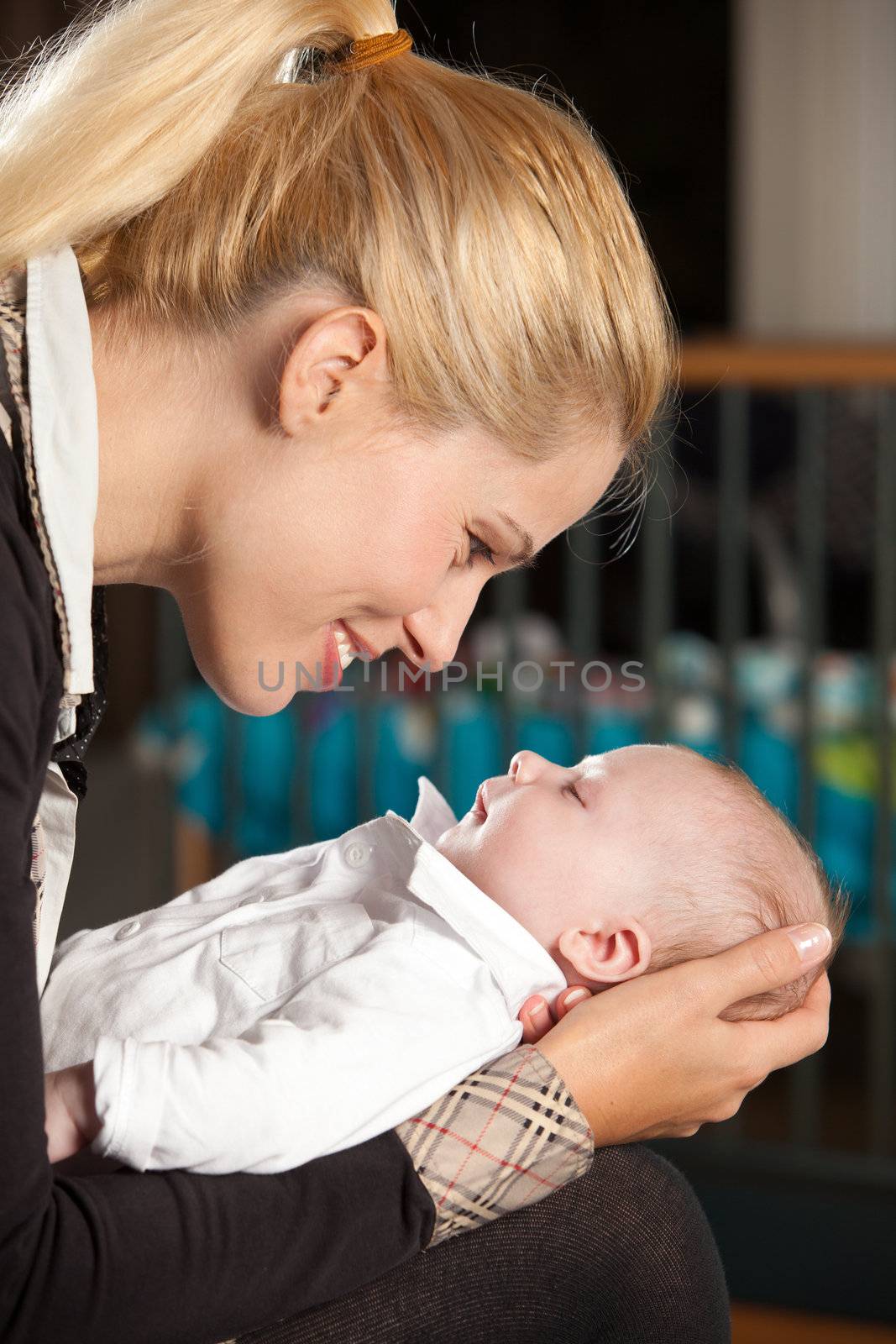 Loving moment between mother and her newborn son