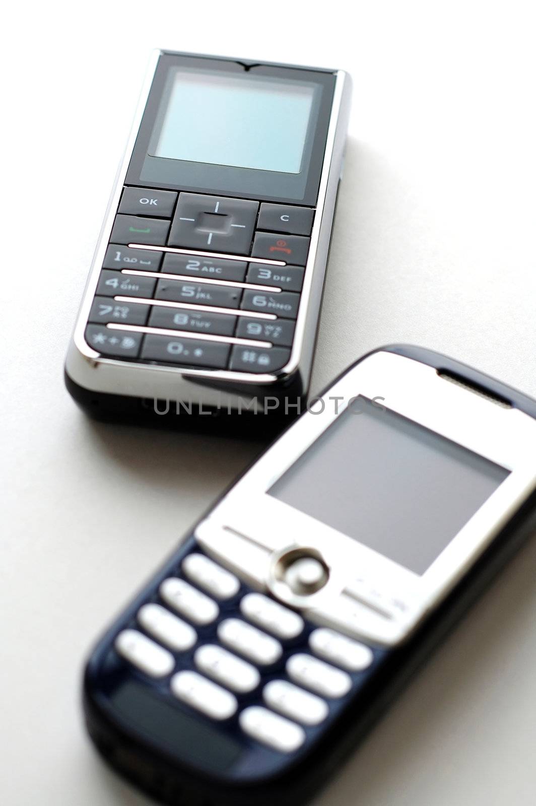 Two modern mobile phones side by side