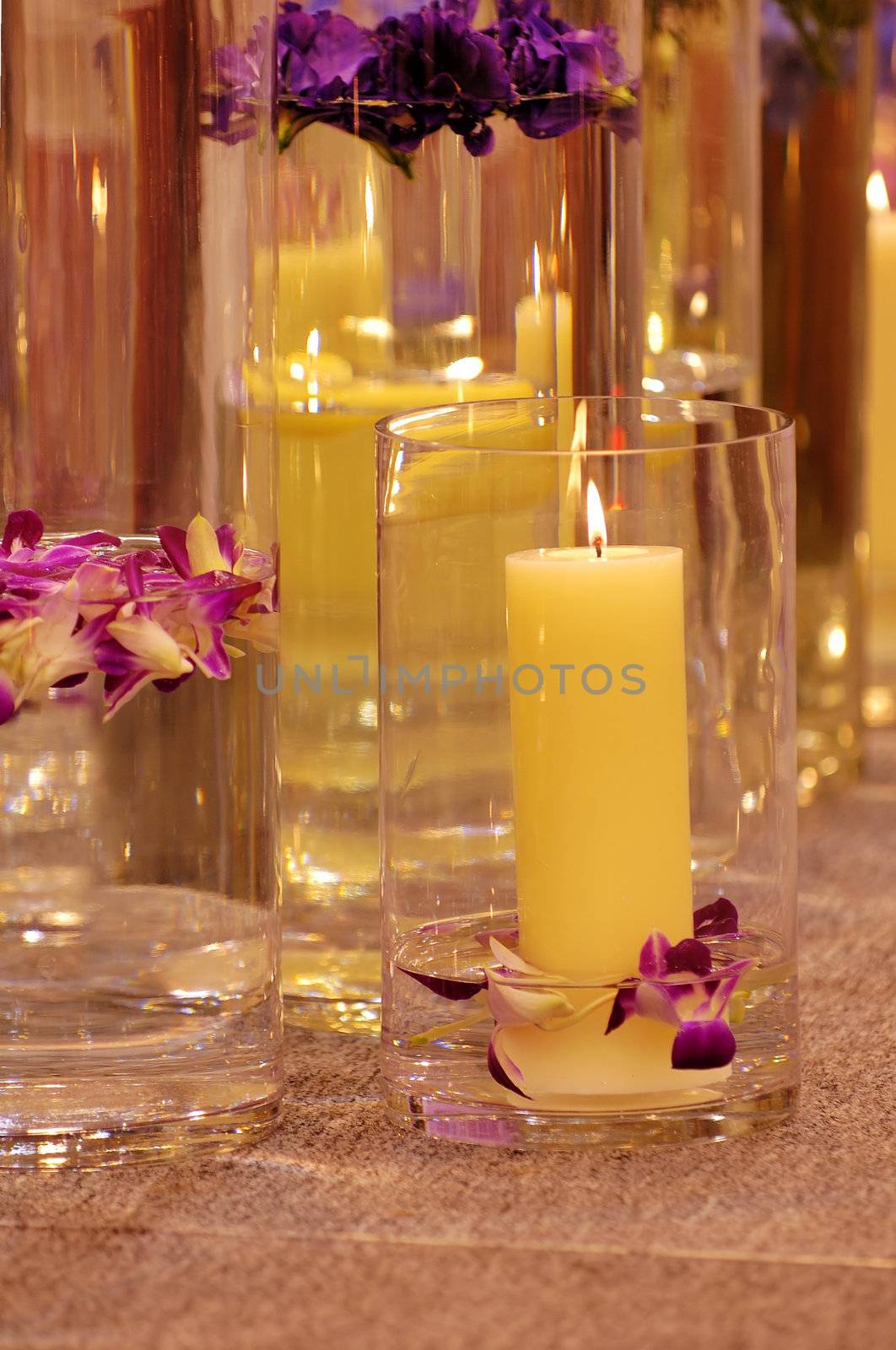 The shot of spa candles and flowers