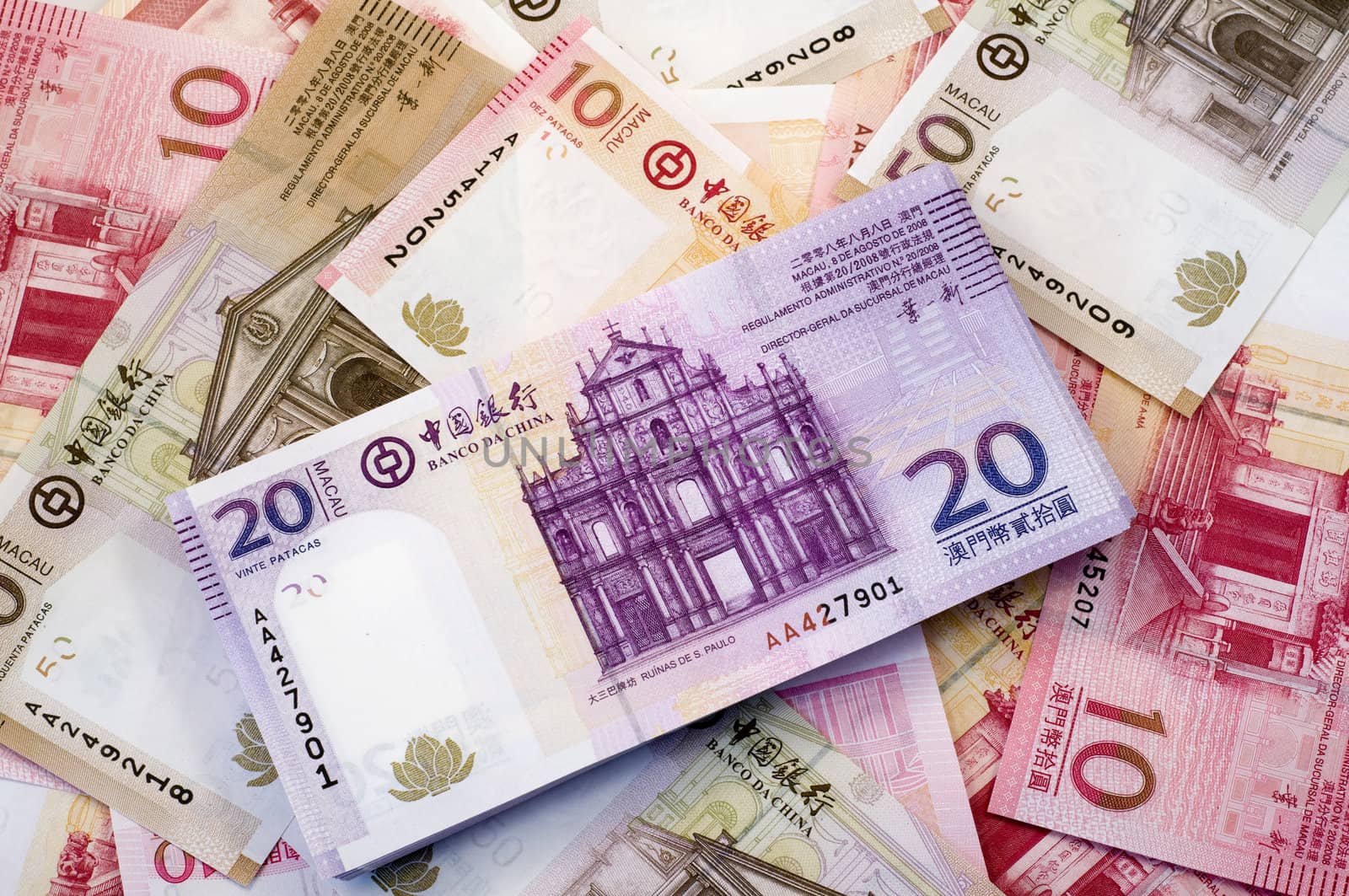 The stack of Macau Patacas (notes) and background 