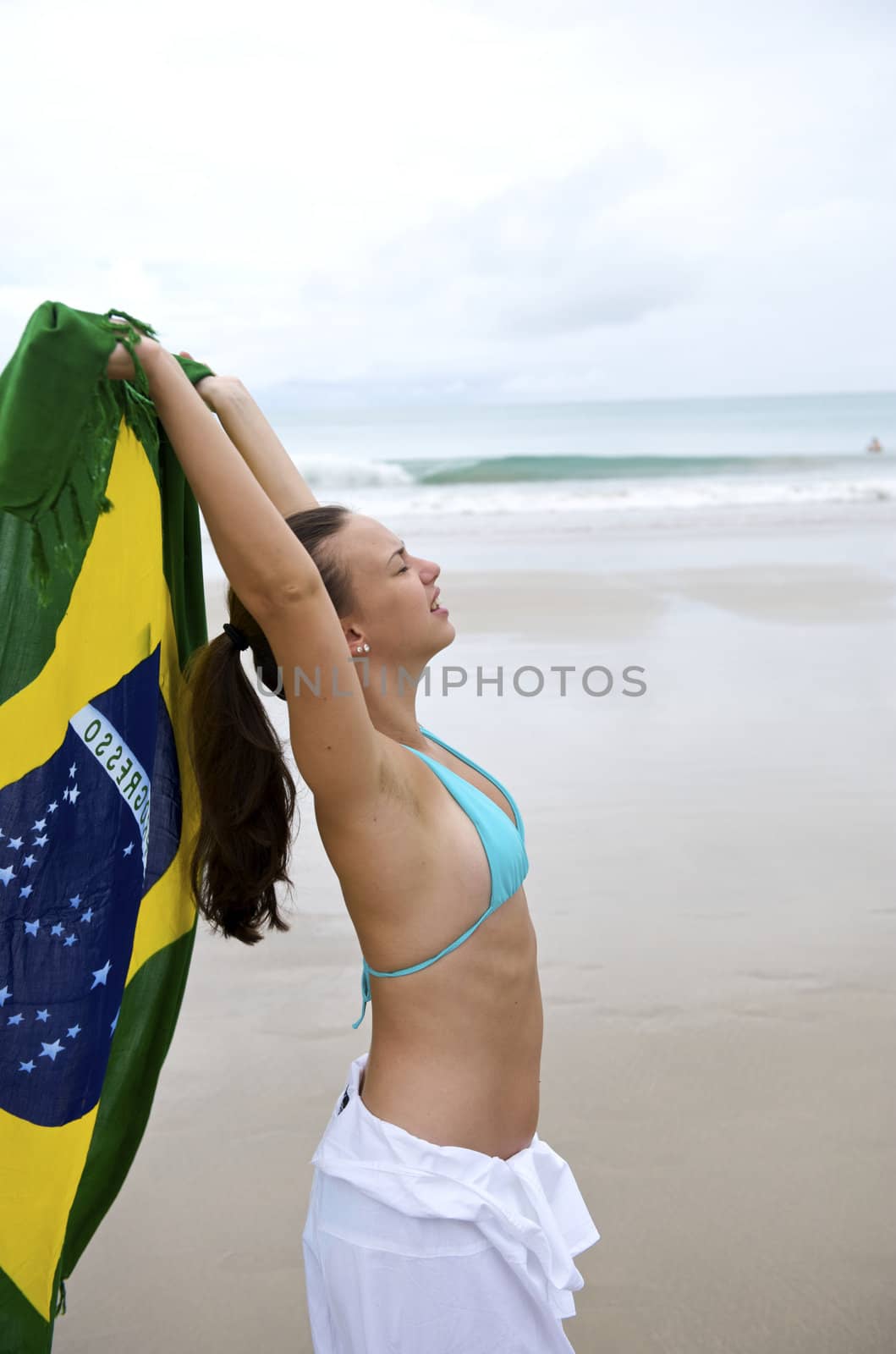 Woman enjoying the beach in Porto de Galinhas, Pernambuco, Brazil