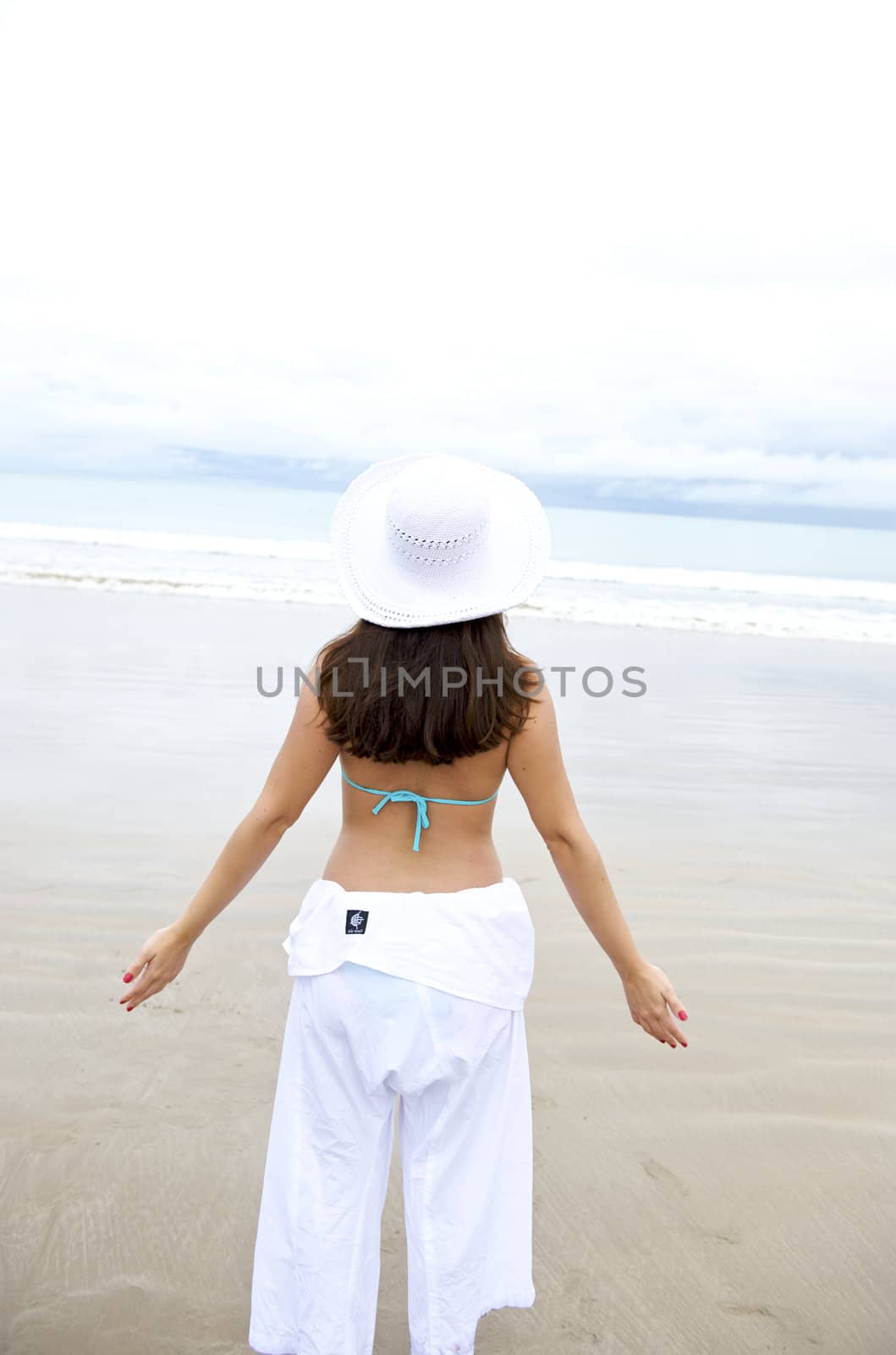 Woman enjoying the ebach in brazil by swimnews