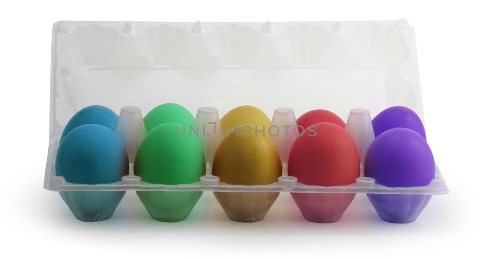 Colored Easter eggs in a plastic box on isolated  background
