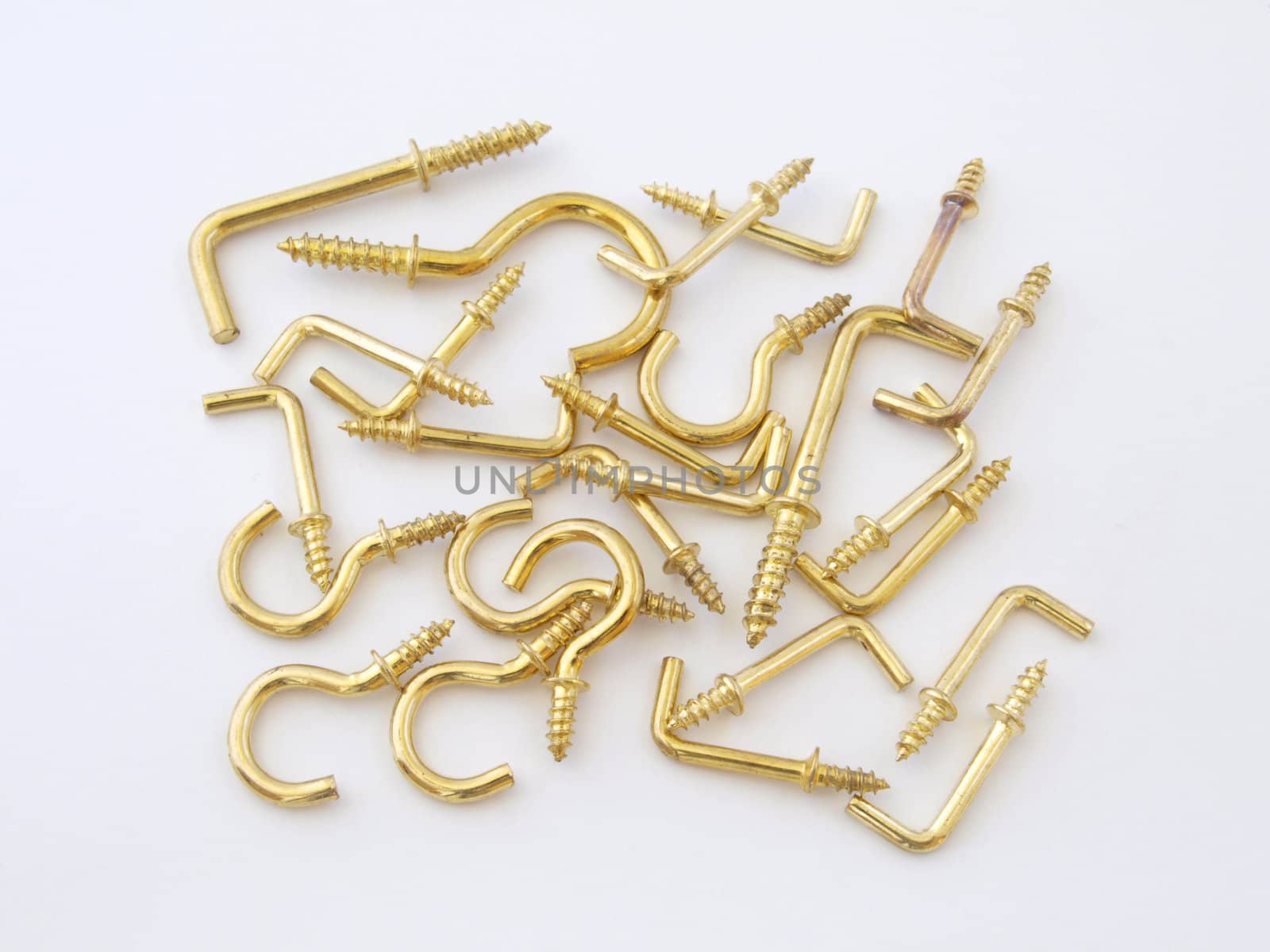 Assorted brass hookes used for hanging light objects.