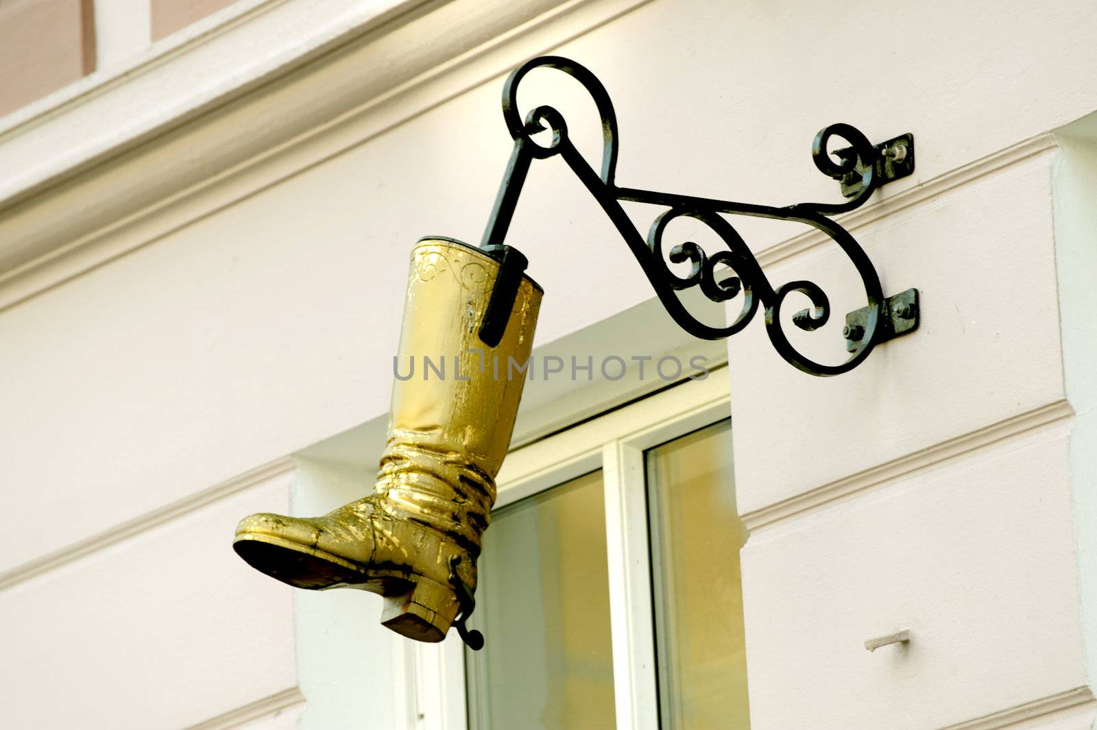 Sign on a shoe workshop In ihe street of Bergen, Norway