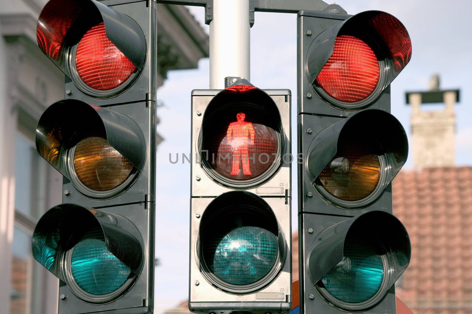 Three traffic lights on the crossroad of Bergen, Norway