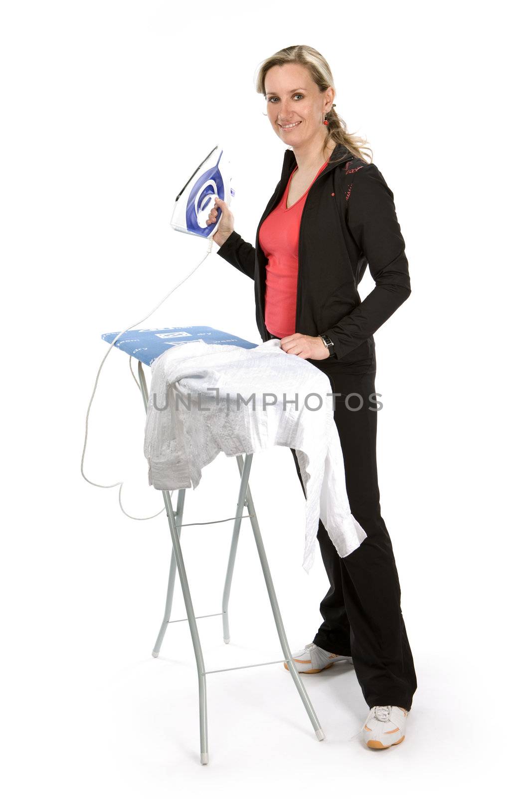 Young women with iron on white background