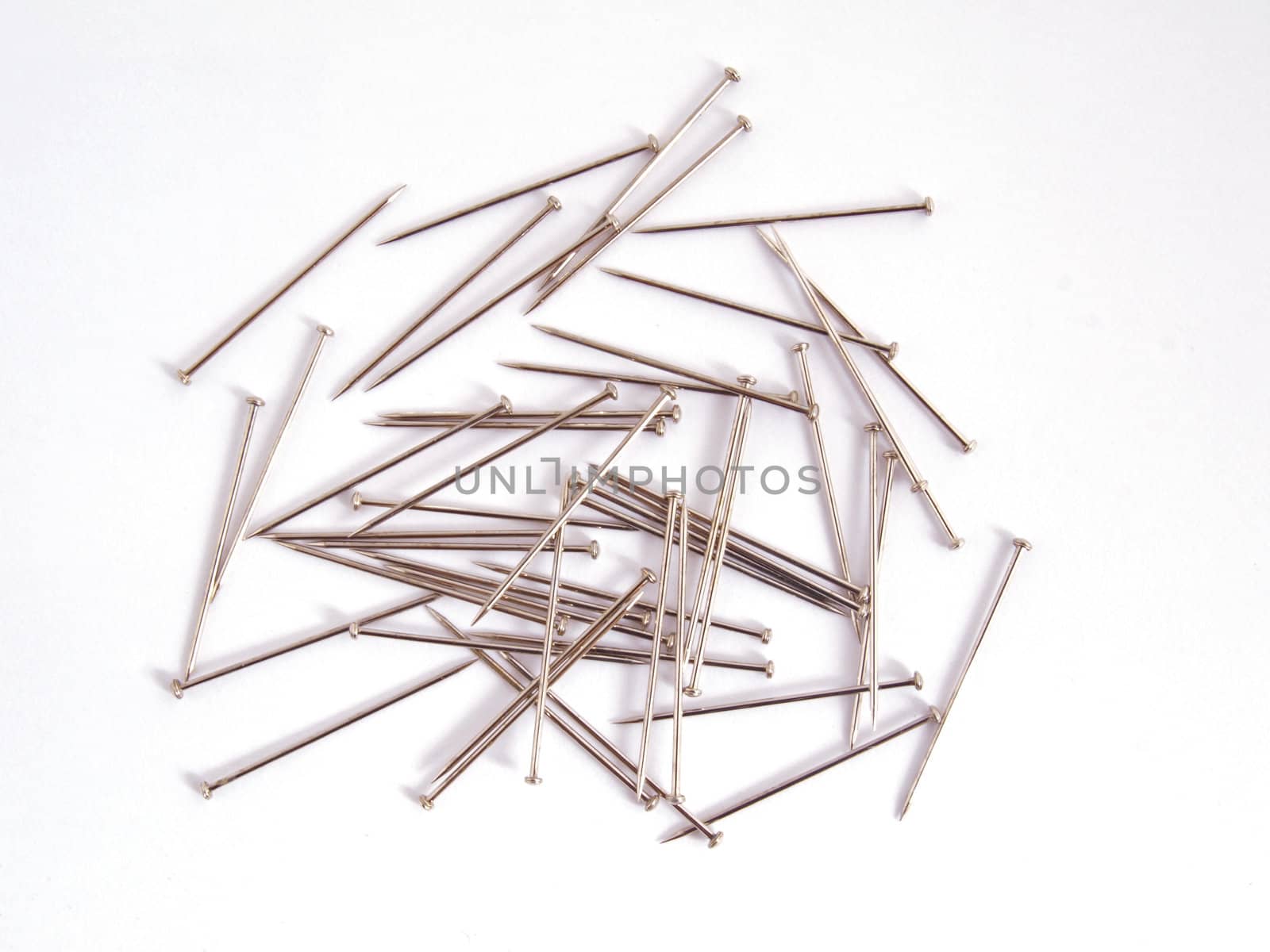 Pin used when sewing on a plain white background.