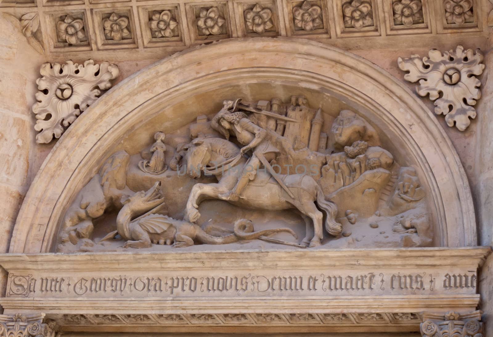 Carving of George and the dragon above church door in Prague