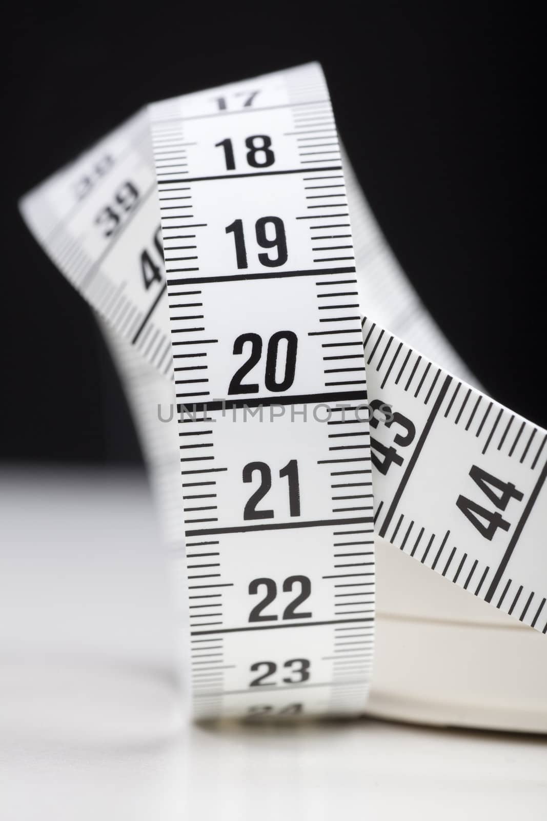 White measuring tape in centimeters