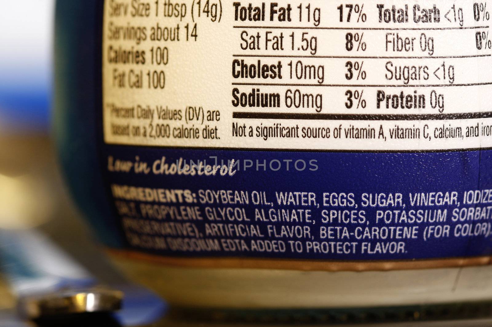 a nutrition label on the back of a mayonaise bottle.
