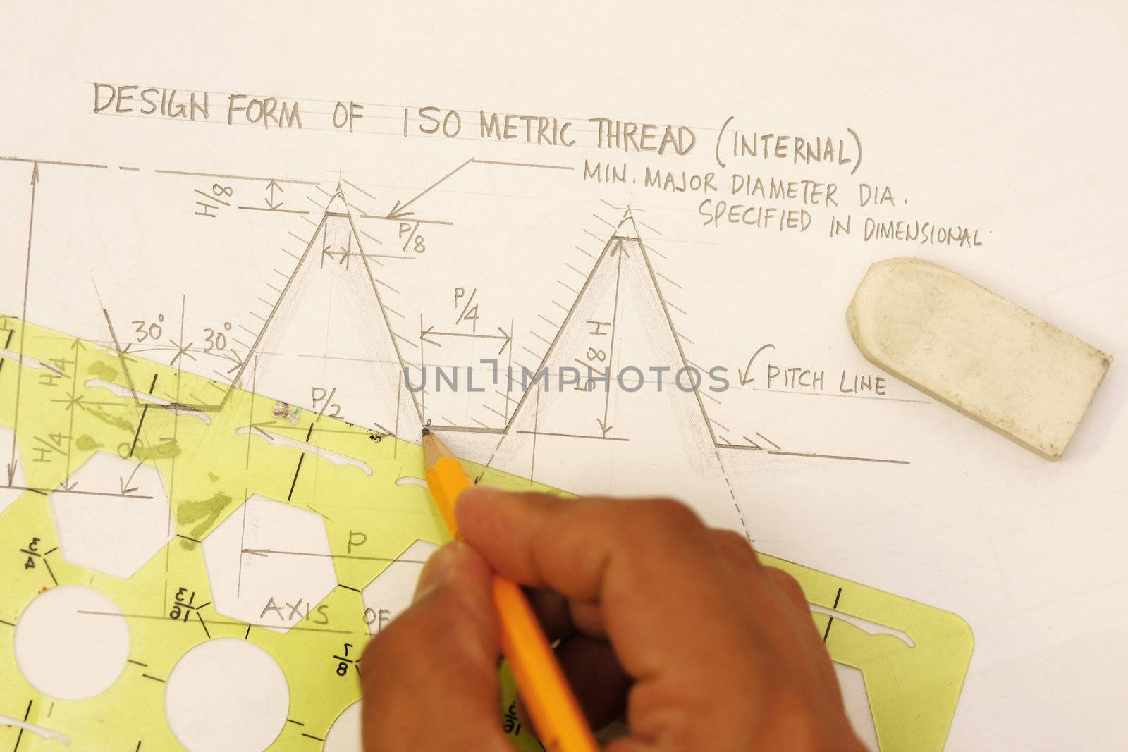 Gear design with calculation and sketch including pencil and eraser.