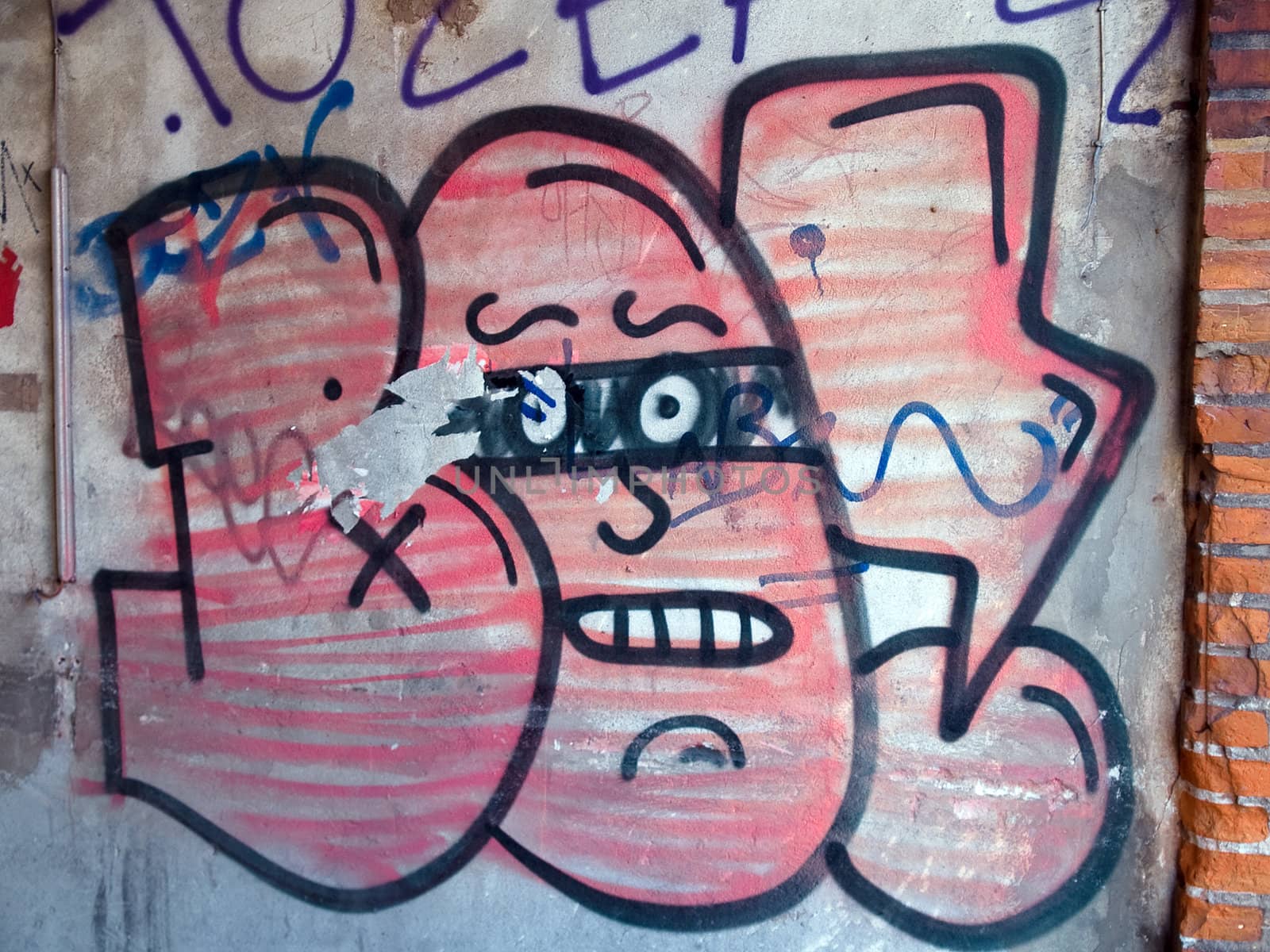 Creative funny cool Graffiti on a white wall