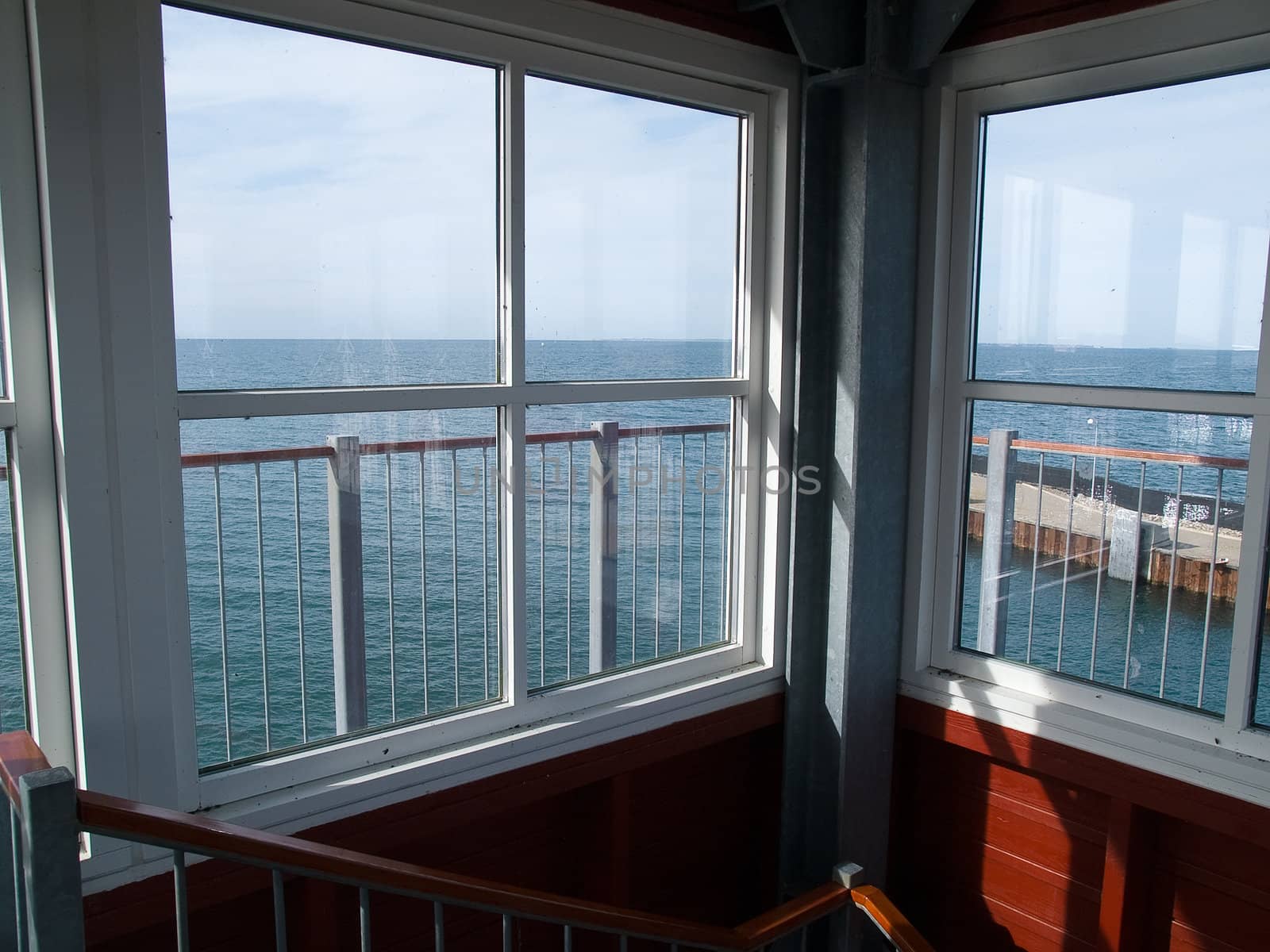 Looking through a window to a beautiful sea ocean landscape