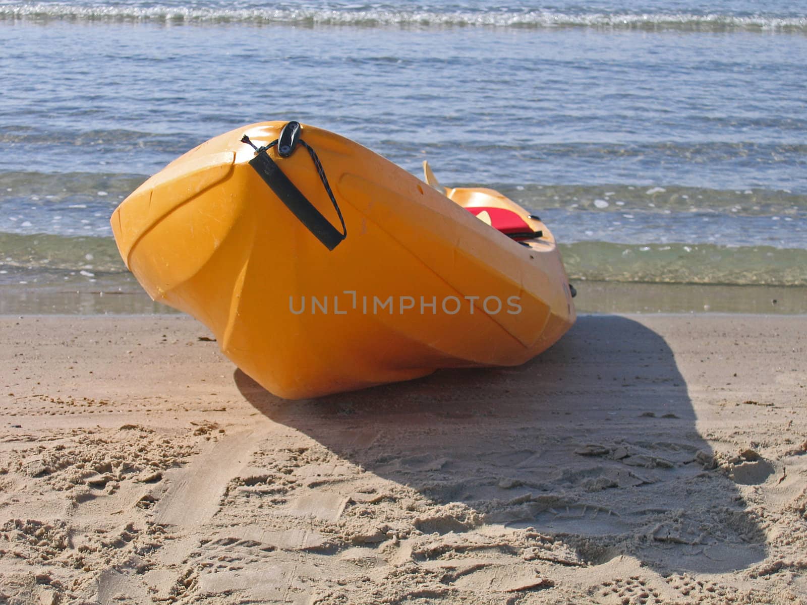 Sea kayaks on the beach ready for action